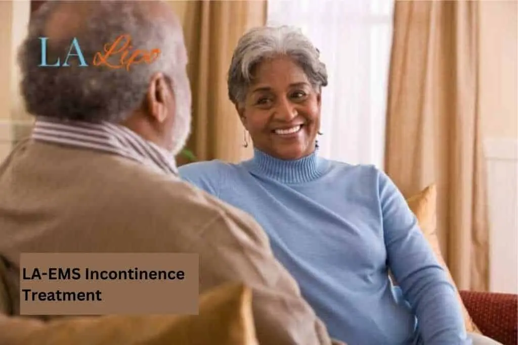 Couple sat smiling at each other - LA-EMS treatment Chesterfield