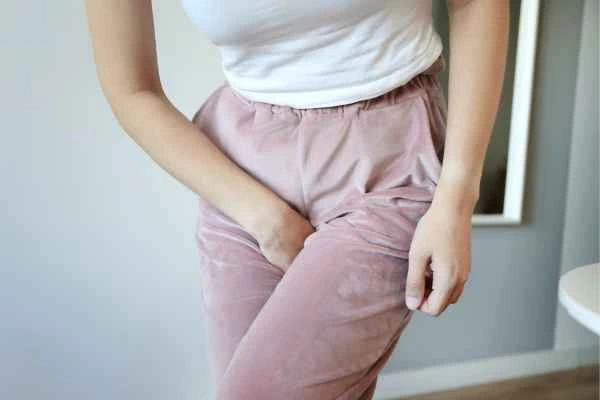 older woman running to the toilet because of urinary incontinence Chesterfield