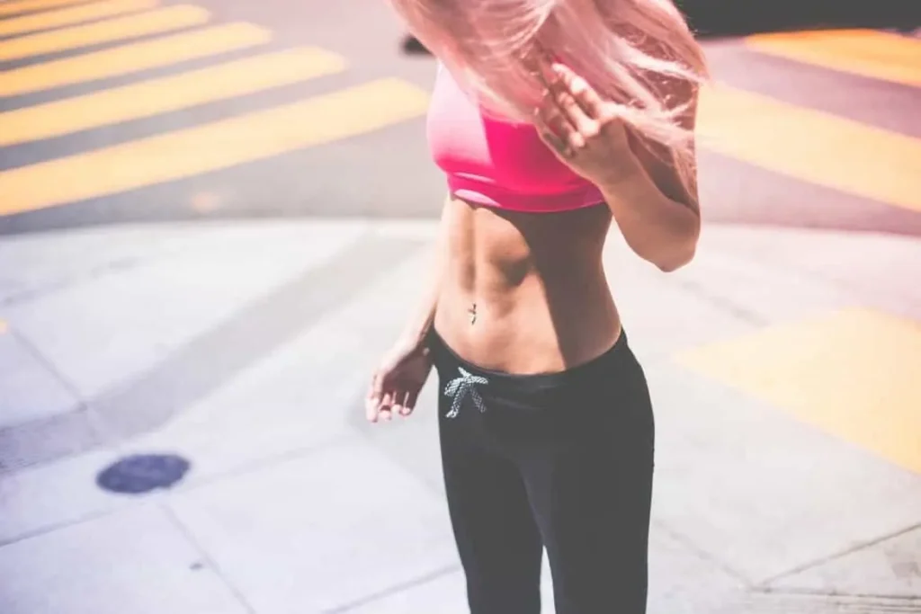 Woman with toned stomach after LA-EMS Body Sculpting Treatment Chesterfield 